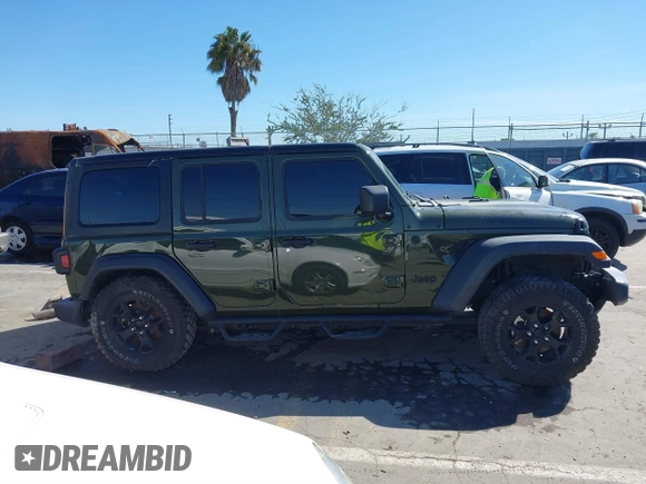 2022 Jeep Wrangler Unlimited Sport with VIN 1C4HJXDG5NW113205, listed as a IAAI auction lot 41836171 with 30,446 mi miles and . Bid and sale history available at DreamBid. Image 14.