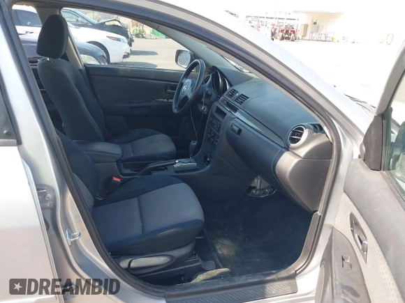 2006 Mazda Mazda3 i with VIN JM1BK12G861534885, listed as a IAAI auction lot 39860656 with 203,722 mi miles. Bid and sale history available at carsss.com. Image 5.