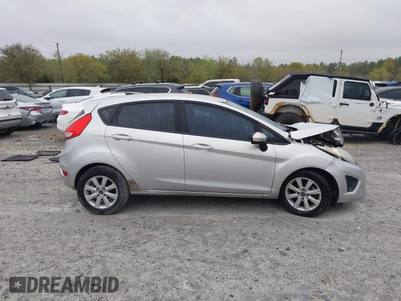 2013 Ford Fiesta SE with VIN 3FADP4EJ6DM107293, listed as a IAAI auction lot 41898229 with 129,694 mi miles. Bid and sale history available at carsss.com. Image 13.