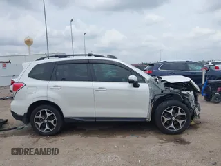 2014 Subaru Forester XT Touring with VIN JF2SJGMC4EH555465, listed as a IAAI auction lot 42357371 with 168,378 mi miles and . Bid and sale history available at DreamBid. Image 14.