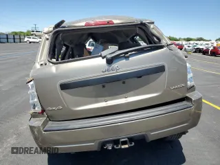 2005 Jeep Grand Cherokee Laredo z VIN 1J4HR48N65C517657, wystawiony jako Copart lot #58774685 z przebiegiem Nie podano mil oraz Szkoda całkowita • Salvage title. Historia ofert i sprzedaży dostępna na DreamBid. Obrazek 6.