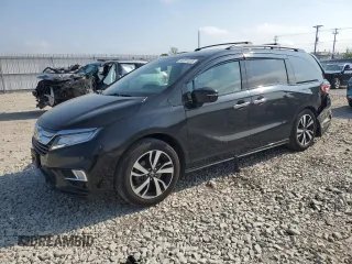 2018 Honda Odyssey Elite z VIN 5FNRL6H9XJB069947, wystawiony jako Copart lot #56701525 z przebiegiem 83 038 mil mil oraz Nie do naprawy • Non repairable. Historia ofert i sprzedaży dostępna na DreamBid. Obrazek 1.