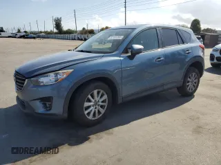 2016 Mazda CX-5 Touring with VIN JM3KE2CY1G0841608, listed as a Copart auction lot 52181265 with 70,600 mi miles and Salvage Title. Bid and sale history available at carsss.com. Image 1.