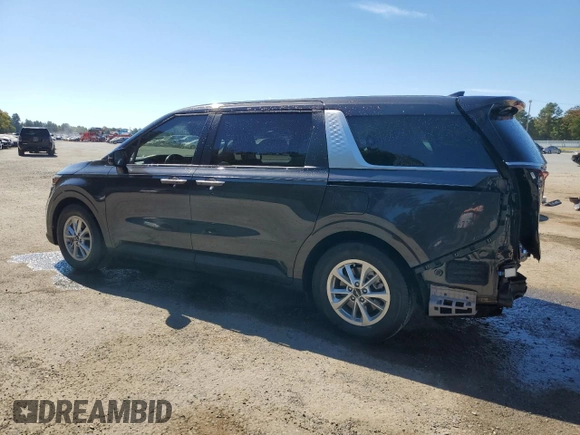 2023 Kia Carnival LX with VIN KNDNB4H37P6249098, listed as a Copart auction lot 76751724 with 26,992 mi miles and Salvage Title. Bid and sale history available at carsss.com. Image 2.