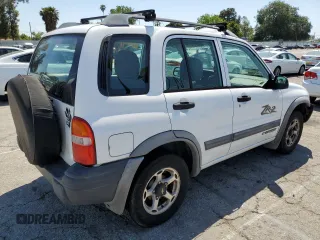 2001 Chevrolet Tracker ZR2 z VIN 2CNBJ734816935414, wystawiony jako Copart lot #54877235 z przebiegiem 117 483 mil mil oraz Szkoda całkowita • Salvage title. Historia ofert i sprzedaży dostępna na DreamBid. Obrazek 3.