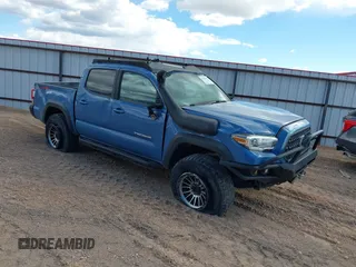 2019 Toyota Tacoma SR with VIN 3TMCZ5AN6KM194530, listed as a IAAI auction lot 41922634 with 55,183 mi miles and . Bid and sale history available at DreamBid. Image 1.