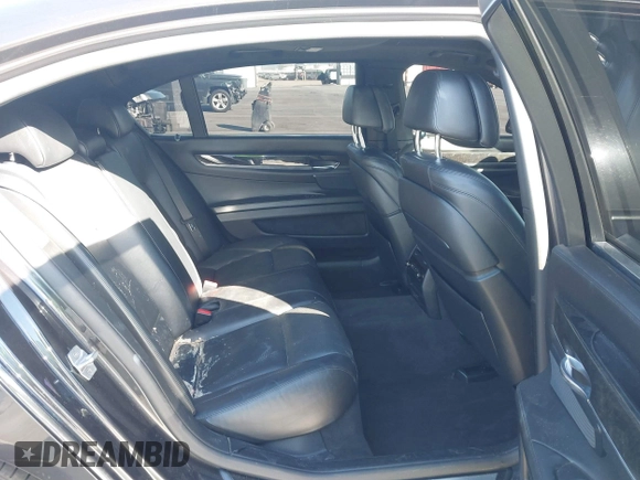 2015 BMW 7 Series 750Li with VIN WBAYE8C52FD780902, listed as a IAAI auction lot 40808265 with 102,774 mi miles. Bid and sale history available at carsss.com. Image 8.