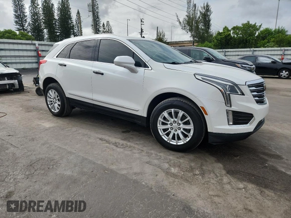 2018 Cadillac XT5 FWD with VIN 1GYKNARSXJZ153562, listed as a Copart auction lot 60137185 with 49,425 mi miles and Clean title. Bid and sale history available at DreamBid. Image 4.