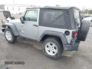 2015 Jeep Wrangler Sport with VIN 1C4AJWAG6FL501160, listed as a IAAI auction lot 41941661 with 134,842 mi miles. Bid and sale history available at carsss.com. Image 3.