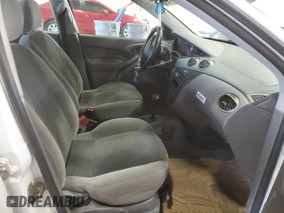 2003 Ford Focus LX with VIN 1FAFP33P43W201570, listed as a Copart auction lot 43130555 with 222,727 mi miles and Salvage Title. Bid and sale history available at carsss.com. Image 7.