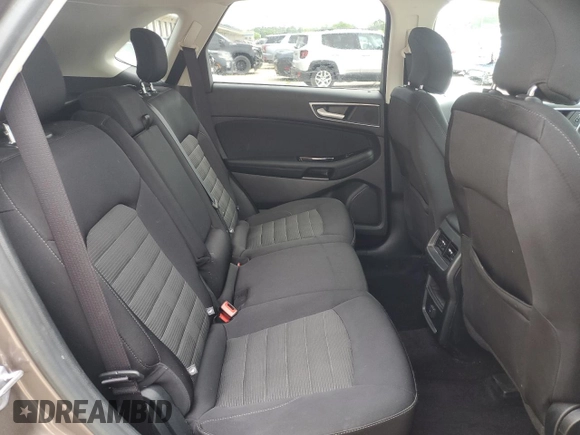 2019 Ford Edge SEL с VIN 2FMPK3J99KBC40023, выставлен на аукционе Copart как лот 61362885 с пробегом 120 508 миль миль и Чистый • Clean title. История ставок и продаж доступна на DreamBid. Изображение 11.