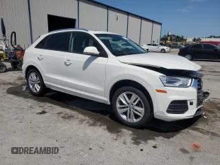 2017 Audi Q3 Premium with VIN WA1BCCFS7HR014683, listed as a Copart auction lot 54739465 with 64,917 mi miles and Salvage title. Bid and sale history available at DreamBid. Image 4.