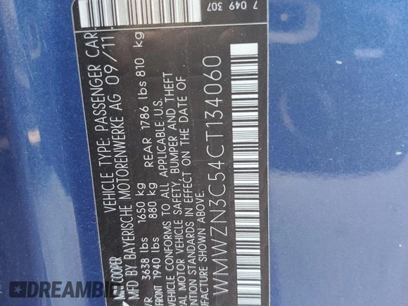 2012 MINI Convertible with VIN WMWZN3C54CT134060, listed as a Copart auction lot 43740175 with 71,818 mi miles and Salvage title. Bid and sale history available at DreamBid. Image 12.