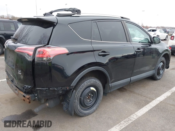 2016 Toyota RAV4 LE with VIN 2T3BFREV3GW447802, listed as a IAAI auction lot 41985438 with 213,247 mi miles. Bid and sale history available at carsss.com. Image 4.