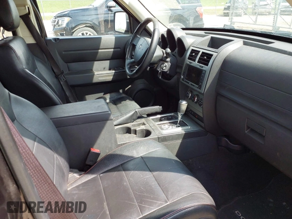 2011 Dodge Nitro Heat with VIN 1D4PU4GX9BW607580, listed as a IAAI auction lot 42105529 with 143,795 mi miles. Bid and sale history available at carsss.com. Image 5.