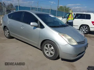2005 Toyota Prius z VIN JTDKB20U753123642, wystawiony jako IAAI lot #42157126 z przebiegiem 241 219 mil mil oraz . Historia ofert i sprzedaży dostępna na DreamBid. Obrazek 1.