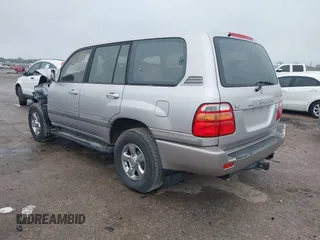 2002 Toyota Land Cruiser with VIN JTEHT05J322029734, listed as a IAAI auction lot 41953160 with 327,101 mi miles. Bid and sale history available at carsss.com. Image 3.