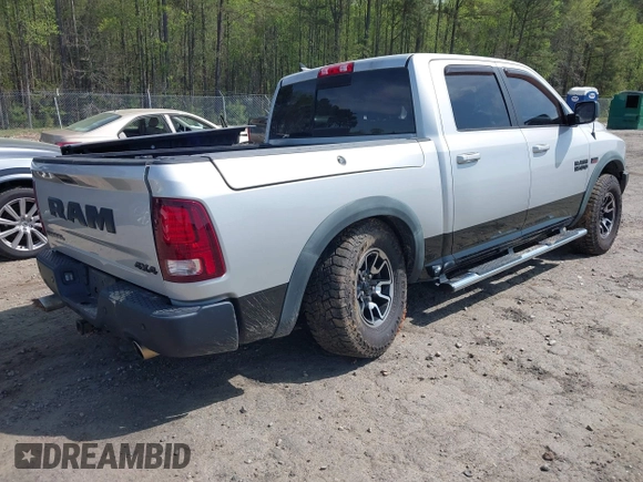 2015 Ram 1500 Rebel z VIN 1C6RR7YT0FS751334, wystawiony jako IAAI lot #41933040 z przebiegiem 167 336 mil mil oraz . Historia ofert i sprzedaży dostępna na DreamBid. Obrazek 4.