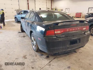 2014 Dodge Charger RT with VIN 2C3CDXDT5EH248671, listed as a IAAI auction lot 41430969 with 173,167 mi miles. Bid and sale history available at carsss.com. Image 3.
