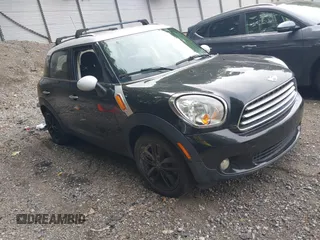 2012 MINI Countryman z VIN WMWZB3C5XCWM30191, wystawiony jako IAAI lot #42435291 z przebiegiem 103 254 mil mil oraz . Historia ofert i sprzedaży dostępna na DreamBid. Obrazek 1.