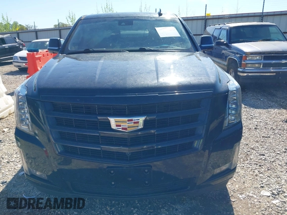 2019 Cadillac Escalade ESV Luxury z VIN 1GYS4HKJXKR389014, wystawiony jako IAAI lot #42060761 z przebiegiem 182 351 mil mil oraz . Historia ofert i sprzedaży dostępna na DreamBid. Obrazek 12.
