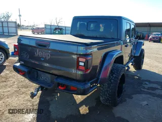2020 Jeep Gladiator Rubicon with VIN 1C6JJTBG5LL179188, listed as a IAAI auction lot 41316367 with 136,670 mi miles and . Bid and sale history available at DreamBid. Image 4.