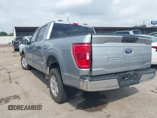 2023 Ford F-150 XL with VIN 1FTEW1C80PFA34183, listed as a IAAI auction lot 42085791 with 60,454 mi miles and . Bid and sale history available at DreamBid. Image 3.