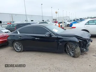 2018 Infiniti Q50 3.0t LUXE with VIN JN1EV7AP1JM351153, listed as a IAAI auction lot 41589119 with 103,915 mi miles. Bid and sale history available at carsss.com. Image 13.