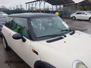 2004 MINI Hardtop with VIN WMWRC33434TJ60941, listed as a IAAI auction lot 39078161 with 143,107 mi miles and . Bid and sale history available at DreamBid. Image 19.