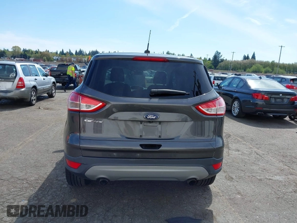 2015 Ford Escape SE with VIN 1FMCU0G75FUB31989, listed as a IAAI auction lot 42040121 with 87,068 mi miles and . Bid and sale history available at DreamBid. Image 17.
