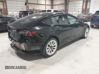 2023 Tesla Model 3 with VIN 5YJ3E1EA5PF552241, listed as a IAAI auction lot 41876487 with 18,533 mi miles and . Bid and sale history available at carsss.com. Image 4.