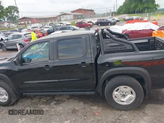 2024 Nissan Frontier SV with VIN 1N6ED1EK2RN627094, listed as a IAAI auction lot 42308056 with 5,692 mi miles and . Bid and sale history available at DreamBid. Image 14.