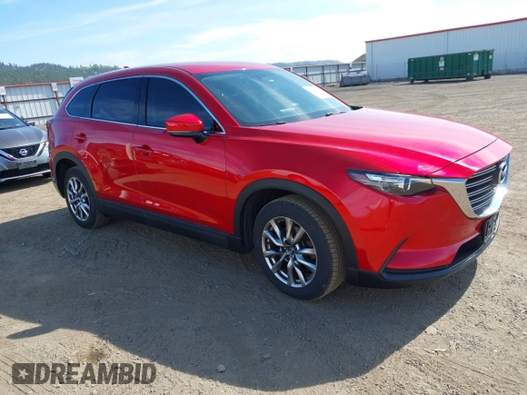 2016 Mazda CX-9 Touring z VIN JM3TCACY9G0122174, wystawiony jako IAAI lot #42613740 z przebiegiem 148 646 mil mil oraz . Historia ofert i sprzedaży dostępna na DreamBid. Obrazek 1.