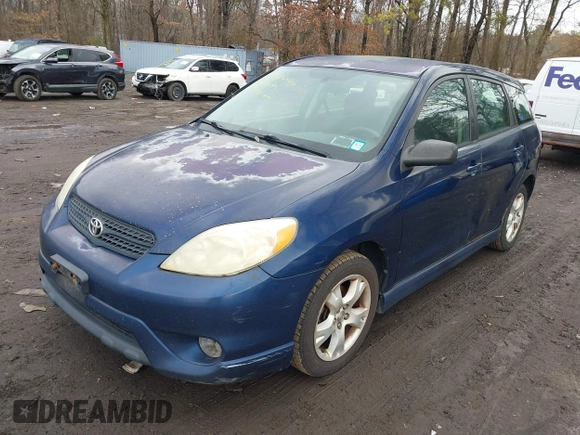 2006 Toyota Matrix STD with VIN 2T1KR32E26C596932, listed as a IAAI auction lot 41706466 with 241,246 mi miles. Bid and sale history available at carsss.com. Image 6.