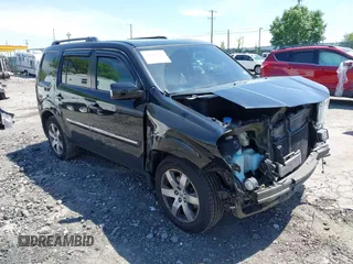 2013 Honda Pilot Touring z VIN 5FNYF4H97DB052793, wystawiony jako IAAI lot #42242353 z przebiegiem 196 732 mil mil oraz . Historia ofert i sprzedaży dostępna na DreamBid. Obrazek 1.