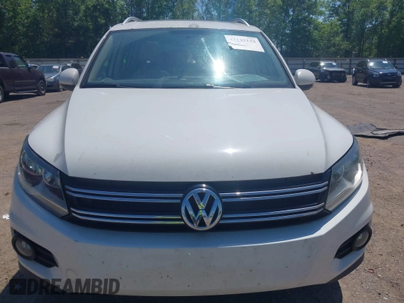 2013 Volkswagen Tiguan SE with VIN WVGAV7AX4DW528410, listed as a IAAI auction lot 42142132 with 148,511 mi miles and . Bid and sale history available at DreamBid. Image 6.