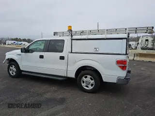 2011 Ford F-150 XL with VIN 1FTEW1CM1BKE10936, listed as a Copart auction lot 50804515 with 222,964 mi miles and Salvage Title. Bid and sale history available at carsss.com. Image 2.