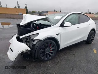 2022 Tesla Model Y Performance with VIN 7SAYGDEFXNF384268, listed as a IAAI auction lot 41558359 with 33,870 mi miles and . Bid and sale history available at DreamBid. Image 18.