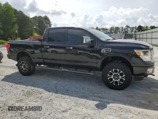 2016 Nissan Titan SL z VIN 1N6BA1F46GN513494, wystawiony jako Copart lot #55271185 z przebiegiem 97 890 mil mil oraz Tytuł czysty. Historia ofert i sprzedaży dostępna na DreamBid. Obrazek 4.