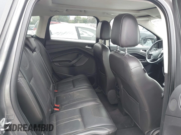 2013 Ford Escape Titanium with VIN 1FMCU0J9XDUD86354, listed as a IAAI auction lot 42420780 with 260,995 mi miles and . Bid and sale history available at DreamBid. Image 8.