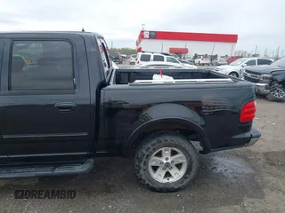 2002 Ford F-150 XLT with VIN 1FTRW08L32KD90202, listed as a IAAI auction lot 41850546 with 256,807 mi miles. Bid and sale history available at carsss.com. Image 18.