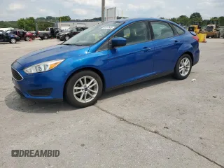 2018 Ford Focus SE with VIN 1FADP3F23JL214428, listed as a Copart auction lot 60552465 with 33,699 mi miles and Salvage title. Bid and sale history available at DreamBid. Image 2.