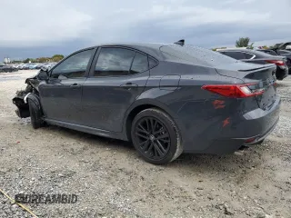 2025 Toyota Camry LE with VIN 4T1DAACK8SU580753, listed as a Copart auction lot 52051845 with 1,411 mi miles and Salvage Title. Bid and sale history available at carsss.com. Image 2.