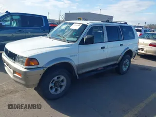 1997 Mitsubishi Montero Sport LS with VIN JA4MT31P2VP019597, listed as a IAAI auction lot 41964200 with 1 mi miles. Bid and sale history available at carsss.com. Image 2.