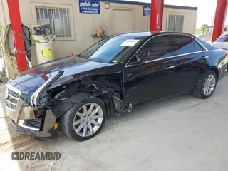 2014 Cadillac CTS RWD with VIN 1G6AP5SX4E0149156, listed as a IAAI auction lot 42681914 with 49,539 mi miles and . Bid and sale history available at DreamBid. Image 2.