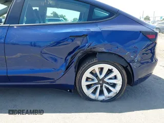 2023 Tesla Model 3 z VIN 5YJ3E1EA6PF547209, wystawiony jako IAAI lot #42511077 z przebiegiem 6 125 mil mil oraz . Historia ofert i sprzedaży dostępna na DreamBid. Obrazek 6.
