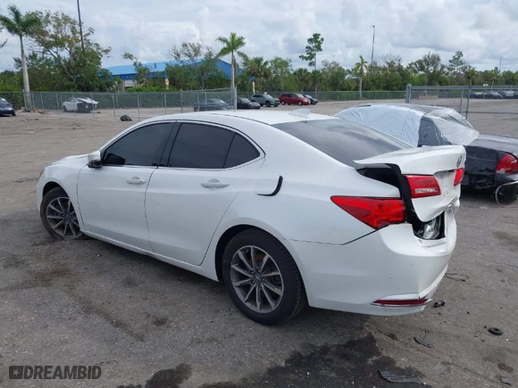 2020 Acura TLX with VIN 19UUB1F33LA001937, listed as a IAAI auction lot 40716068 with 51,973 mi miles. Bid and sale history available at carsss.com. Image 3.