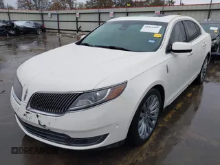 2013 Lincoln MKS with VIN 1LNHL9DK4DG605058, listed as a IAAI auction lot 41068489 with 101,801 mi miles. Bid and sale history available at carsss.com. Image 2.