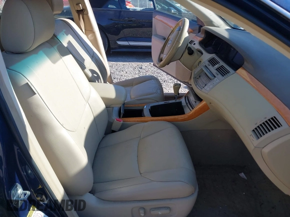 2007 Toyota Avalon XL with VIN 4T1BK36B97U210348, listed as a IAAI auction lot 41698166 with 167,705 mi miles. Bid and sale history available at carsss.com. Image 5.