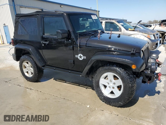 2009 Jeep Wrangler X with VIN 1J4FA24139L730383, listed as a Copart auction lot 51914935 with 168,265 mi miles and Salvage Title. Bid and sale history available at DreamBid. Image 4.